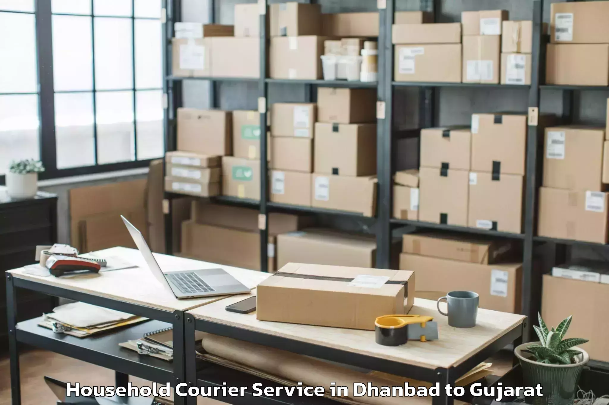 Affordable Dhanbad to Porbandar Airport Pbd Household Courier